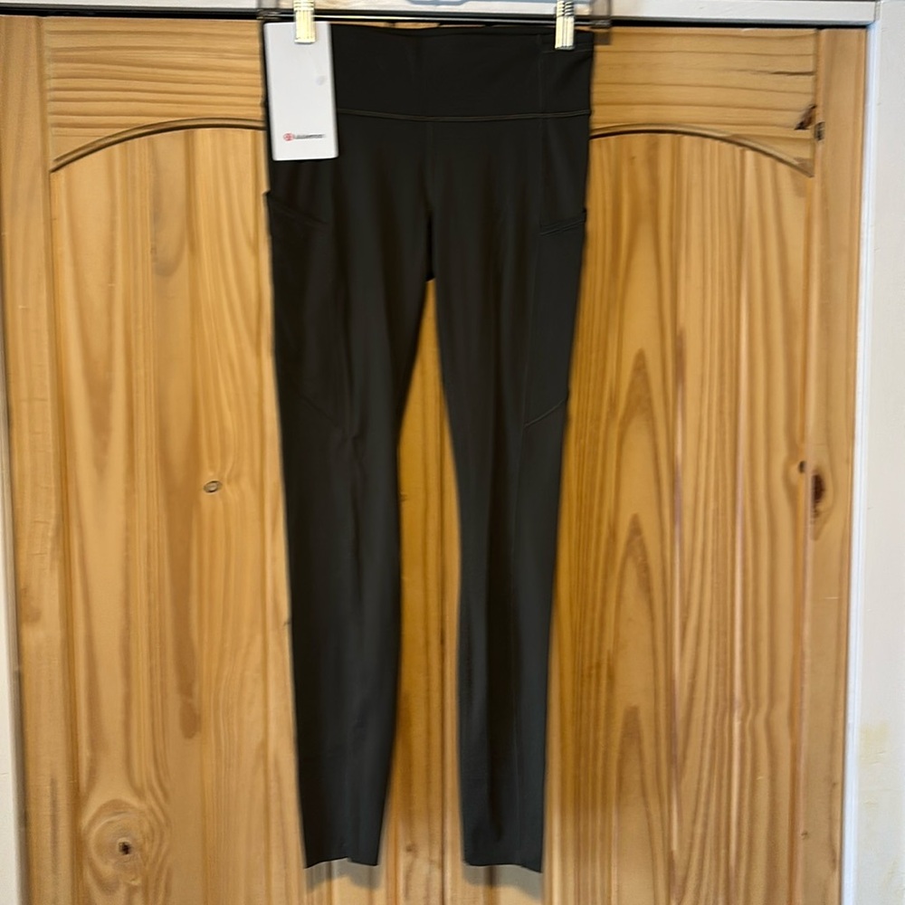 Lululemon Fast and Free tight 28” size 6 dark olive EUC